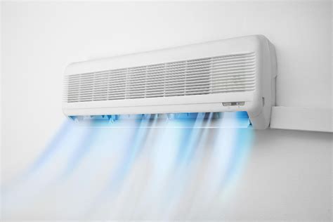 what causes an air conditioner to freeze up and how does this relate to the impact of climate change on global weather patterns?